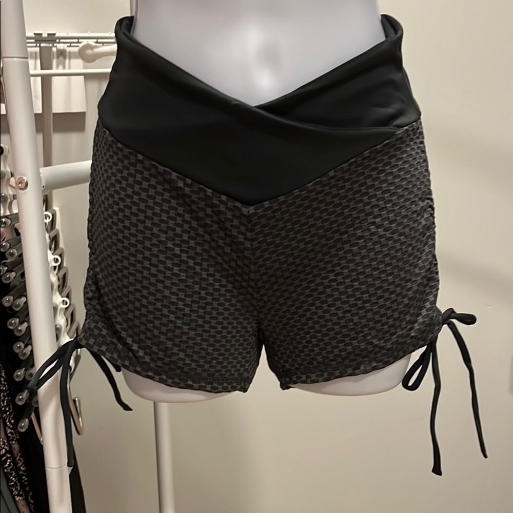 Black Athletic Shorts with Adjustable Ties and Textured Design